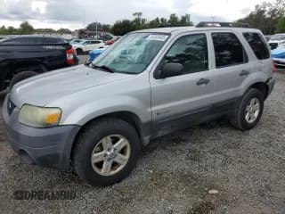 ✅ 2007 Ford Escape Hybrid • VIN: 1FMYU49H67KA35000 • Лот: 80333455. Опубликован ранее на Copart с пробегом 152 640 миль. Бесплатный доступ к архиву аукционных продаж из США и подробный отчёт об истории автомобиля на DreamBid. Изображение 1.