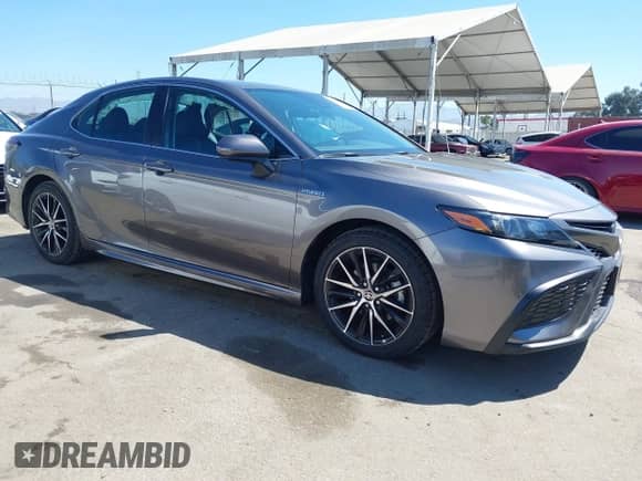 2021 Toyota Camry Hybrid SE z VIN 4T1G31AK6MU551359, wystawiony jako IAAI lot #42995923 z przebiegiem 54 373 mil mil oraz . Historia ofert i sprzedaży dostępna na DreamBid. Obrazek 1.