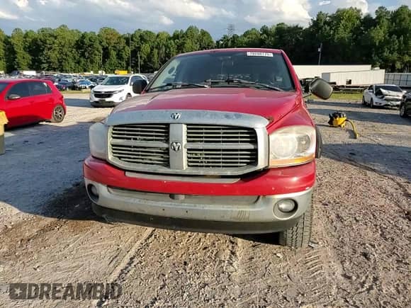2006 Dodge 1500 Laramie z VIN 1D7HU18266S590856, wystawiony jako Copart lot #70208775 z przebiegiem 210 757 mil mil oraz Szkoda całkowita • Salvage title. Historia ofert i sprzedaży dostępna na DreamBid. Obrazek 13.