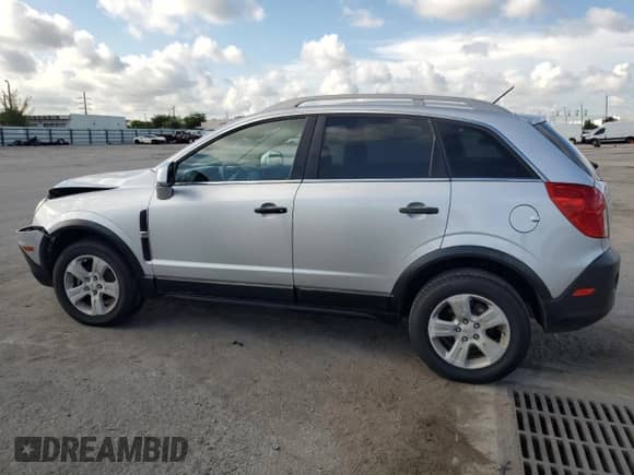 2014 Chevrolet Captiva Sport LS with VIN 3GNAL2EK8ES600984, listed as a Copart auction lot 73083294 with 114,232 mi miles and Non repairable. Bid and sale history available at DreamBid. Image 2.