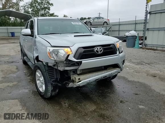 ✅ 2012 Toyota Tacoma PreRunner • VIN: 3TMJU4GN0CM138222 • Lot: 90221605. Listed on Copart with 104,048 mi. Free auction sales archive from the USA and detailed vehicle history report at DreamBid. Image 13.