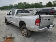 ✅ 2001 Dodge Dakota • VIN: 1B7GL22X01S173048 • Lot: 57018055. Wystawiony na Copart z przebiegiem 163 856 mil. Bezpłatny archiwum sprzedaży aukcyjnych z USA i szczegółowy raport historii pojazdu na DreamBid. Zdjęcie 2.