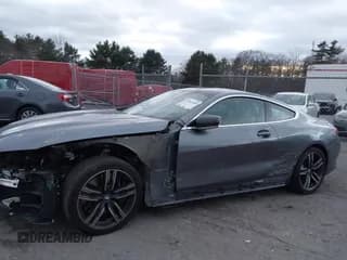 ✅ 2022 BMW 8 Series M850i xDrive • VIN: WBABC4C06NCJ55156 • Лот: 42953080. Опубликован ранее на IAAI с пробегом 20 258 миль. Бесплатный доступ к архиву аукционных продаж из США и подробный отчёт об истории автомобиля на DreamBid. Изображение 6.