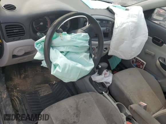 2009 Hyundai Accent Auto GLS z VIN KMHCN46C99U367181, wystawiony jako Copart lot #67382084 z przebiegiem 200 446 mil mil oraz Szkoda całkowita • Salvage title. Historia ofert i sprzedaży dostępna na DreamBid. Obrazek 8.