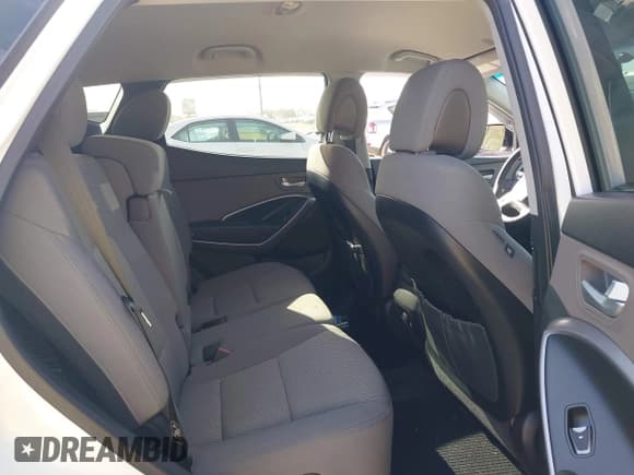 ✅ 2016 Hyundai Santa Fe • VIN: 5XYZTDLB4GG360041 • Лот: 43586922. Опубликован ранее на IAAI с пробегом 96 610 миль. Бесплатный доступ к архиву аукционных продаж из США и подробный отчёт об истории автомобиля на DreamBid. Изображение 8.