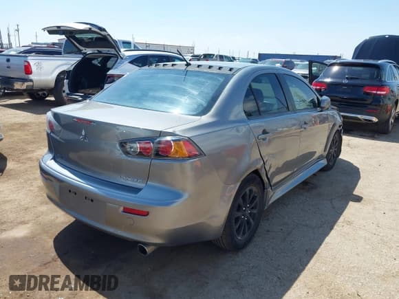 ✅ 2014 Mitsubishi Lancer ES • VIN: JA32U2FU4EU010886 • Lot: 42748812. Listed on IAAI with 133,362 mi. Free auction sales archive from the USA and detailed vehicle history report at DreamBid. Image 4.