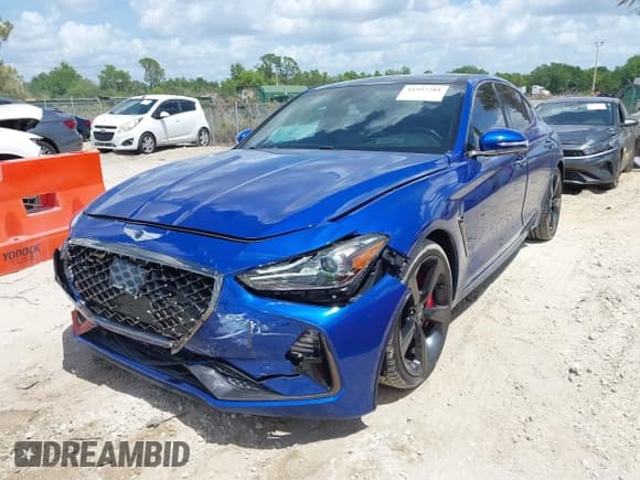✅ 2021 Genesis G70 3.3T • VIN: KMTG34LE0MU073034 • Lot: 41957281. Listed on IAAI with 36,868 mi. Free auction sales archive from the USA and detailed vehicle history report at DreamBid. Image 2.