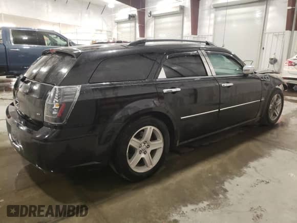 2005 Dodge Magnum RT z VIN 2D8GV58255H550673, wystawiony jako Copart lot #74340604 z przebiegiem 206 578 mil mil oraz Szkoda całkowita • Salvage title. Historia ofert i sprzedaży dostępna na DreamBid. Obrazek 3.
