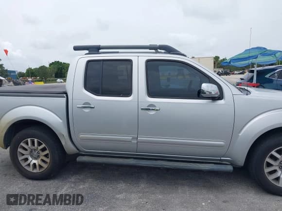 ✅ 2010 Nissan Frontier SE • VIN: 1N6AD0ER7AC404863 • Lot: 42421937. Wystawiony na IAAI z przebiegiem 200 669 mil. Bezpłatny archiwum sprzedaży aukcyjnych z USA i szczegółowy raport historii pojazdu na DreamBid. Zdjęcie 13.