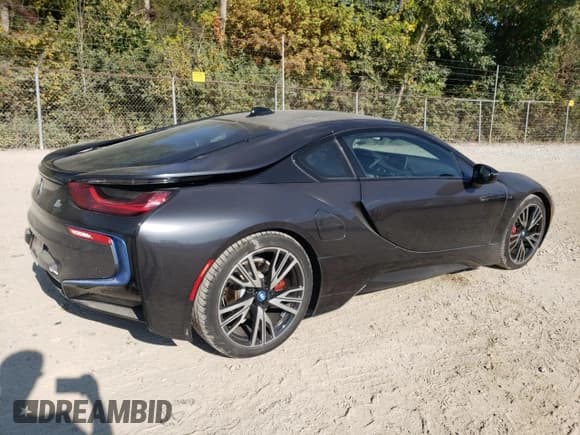 ✅ 2017 BMW i8 • VIN: WBY2Z2C58HV871162 • Лот: 80842795. Опубликован ранее на Copart с пробегом 97 978 миль. Бесплатный доступ к архиву аукционных продаж из США и подробный отчёт об истории автомобиля на DreamBid. Изображение 3.