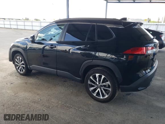 ✅ 2023 Toyota Corolla Cross XLE • VIN: 7MUDAABG6PV048792 • Lot: 56819095. Listed on Copart with 59,189 mi. Free auction sales archive from the USA and detailed vehicle history report at DreamBid. Image 2.