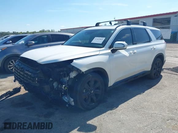 ✅ 2023 Hyundai Palisade XRT • VIN: KM8R34GE8PU560774 • Лот: 41463864. Опубликован ранее на IAAI с пробегом 52 783 миль. Бесплатный доступ к архиву аукционных продаж из США и подробный отчёт об истории автомобиля на DreamBid. Изображение 18.