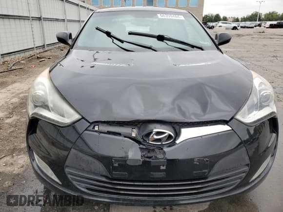 ✅ 2015 Hyundai Veloster • VIN: KMHTC6ADXFU221711 • Lot: 66359484. Wystawiony na Copart z przebiegiem 69 223 mil. Bezpłatny archiwum sprzedaży aukcyjnych z USA i szczegółowy raport historii pojazdu na DreamBid. Zdjęcie 5.