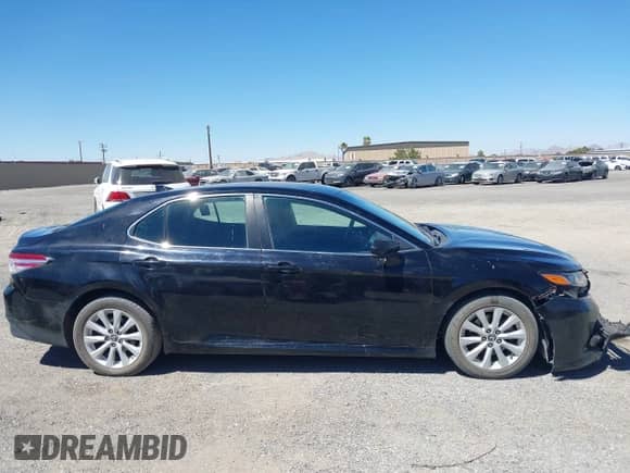 2019 Toyota Camry LE with VIN 4T1B11HK1KU185930, listed as a IAAI auction lot 43027742 with 151,805 mi miles and . Bid and sale history available at DreamBid. Image 13.