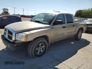 2005 Dodge Dakota SLT z VIN 1D7HW48N15S260885, wystawiony jako Copart lot #71652084 z przebiegiem 189 214 mil mil oraz Szkoda całkowita • Salvage title. Historia ofert i sprzedaży dostępna na DreamBid. Obrazek 1.