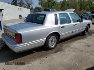 ✅ 1996 Lincoln Town Car Executive • VIN: 1LNLM81W4TY707168 • Lot: 70587254. Listed on Copart with Not provided. Free auction sales archive from the USA and detailed vehicle history report at DreamBid. Image 3.