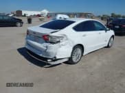 ✅ 2014 Ford Fusion SE Hybrid • VIN: 3FA6P0LU0ER243048 • Lot: 43489940. Listed on IAAI with 238,676 mi. Free auction sales archive from the USA and detailed vehicle history report at DreamBid. Image 4.