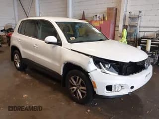 ✅ 2013 Volkswagen Tiguan S • VIN: WVGAV7AX1DW554172 • Lot: 43569906. Listed on IAAI with 127,405 mi. Free auction sales archive from the USA and detailed vehicle history report at DreamBid. Image 1.