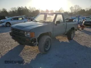 ✅ 1987 Toyota Pickup • VIN: JT4RN63R9H0132370 • Лот: 48291505. Опубликован ранее на Copart с пробегом 249 348 миль. Бесплатный доступ к архиву аукционных продаж из США и подробный отчёт об истории автомобиля на DreamBid. Изображение 1.