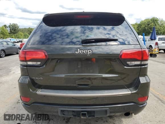 2016 Jeep Grand Cherokee Limited 75th Anniversary с VIN 1C4RJFBG9GC410970, выставлен на аукционе Copart как лот 70992975 с пробегом 248 495 миль миль и Списание • Salvage title. История ставок и продаж доступна на DreamBid. Изображение 6.