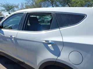 2016 Hyundai Santa Fe z VIN 5XYZT3LB5GG375612, wystawiony jako IAAI lot #43566078 z przebiegiem 112 336 mil mil oraz . Historia ofert i sprzedaży dostępna na DreamBid. Obrazek 6.