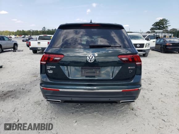 ✅ 2019 Volkswagen Tiguan SEL Premium • VIN: 3VV4B7AX6KM112657 • Лот: 80394125. Опубликован ранее на Copart с пробегом 74 412 миль. Бесплатный доступ к архиву аукционных продаж из США и подробный отчёт об истории автомобиля на DreamBid. Изображение 6.