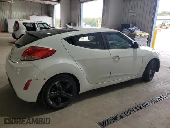 ✅ 2012 Hyundai Veloster w/Red Int • VIN: KMHTC6AD8CU039761 • Lot: 84596195. Listed on Copart with 120,240 mi. Free auction sales archive from the USA and detailed vehicle history report at DreamBid. Image 3.