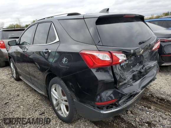 ✅ 2018 Chevrolet Equinox Premier • VIN: 2GNAXVEV1J6141015 • Лот: 84877835. Опубликован ранее на Copart с пробегом Не указан. Бесплатный доступ к архиву аукционных продаж из США и подробный отчёт об истории автомобиля на DreamBid. Изображение 2.