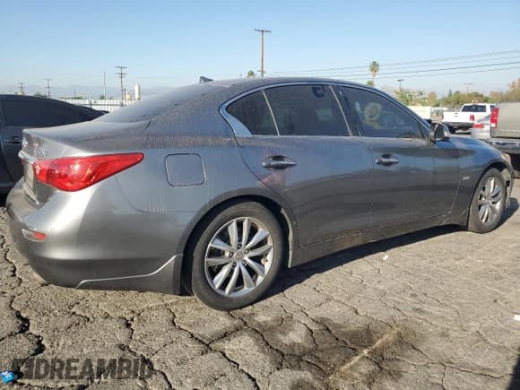 ✅ 2016 Infiniti Q50 Premium • VIN: JN1CV7AP3GM200511 • Lot: 90951175. Wystawiony na Copart z przebiegiem 196 069 mil. Bezpłatny archiwum sprzedaży aukcyjnych z USA i szczegółowy raport historii pojazdu na DreamBid. Zdjęcie 3.