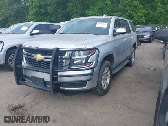 2016 Chevrolet Tahoe Commercial with VIN 1GNSKFEC8GR272043, listed as a IAAI auction lot 42127240 with 209,570 mi miles and . Bid and sale history available at DreamBid. Image 17.