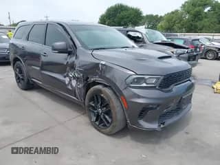 2021 Dodge Durango R/T with VIN 1C4SDJCT1MC820407, listed as a IAAI auction lot 42028410 with 75,435 mi miles and . Bid and sale history available at DreamBid. Image 1.