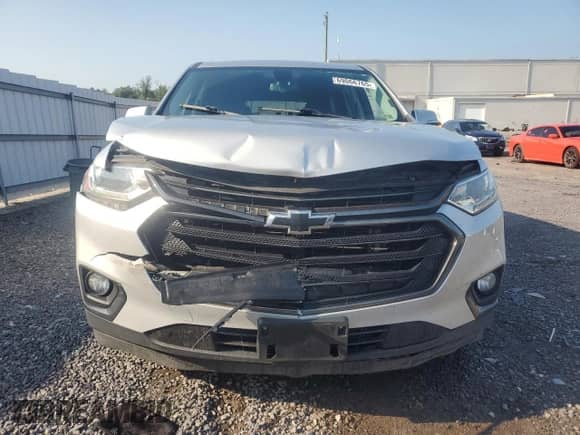 2018 Chevrolet Traverse RS с VIN 1GNERJKX9JJ151305, выставлен на аукционе Copart как лот 69066765 с пробегом 129 674 миль миль и Списание • Salvage title. История ставок и продаж доступна на DreamBid. Изображение 5.