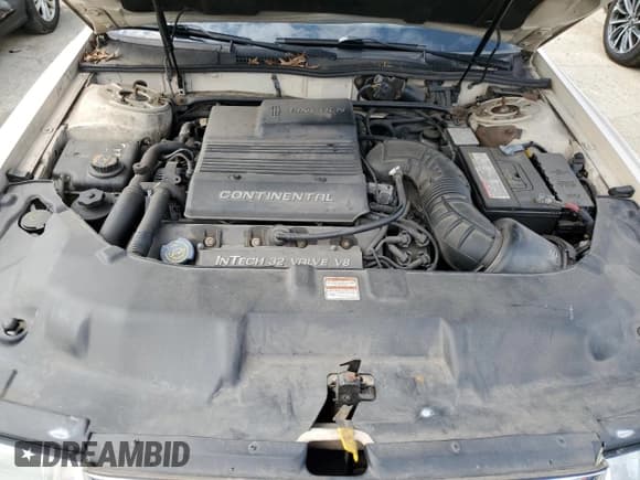 ✅ 1997 Lincoln Continental • VIN: 1LNLM97VXVY609771 • Lot: 52992085. Listed on Copart with 73,450 mi. Free auction sales archive from the USA and detailed vehicle history report at DreamBid. Image 11.