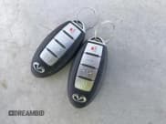 ✅ 2018 Infiniti Q60 Luxe • VIN: JN1EV7EK1JM341107 • Lot: 41827179. Wystawiony na IAAI z przebiegiem 50 101 mil. Bezpłatny archiwum sprzedaży aukcyjnych z USA i szczegółowy raport historii pojazdu na DreamBid. Zdjęcie 11.