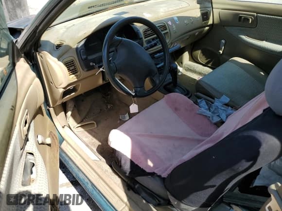 ✅ 1997 Subaru Impreza • VIN: JF1GM4255VH401478 • Lot: 56221515. Listed on Copart with 75,202 mi. Free auction sales archive from the USA and detailed vehicle history report at DreamBid. Image 8.