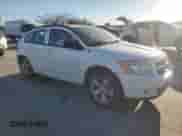 2011 Dodge Caliber Uptown z VIN 1B3CB9HA8BD269272, wystawiony jako Copart lot #42624035 z przebiegiem 143 054 mil mil oraz Szkoda całkowita • Salvage title. Historia ofert i sprzedaży dostępna na DreamBid. Obrazek 4.