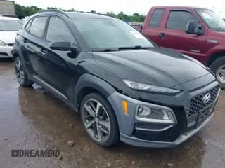 2018 Hyundai Kona Ultimate z VIN KM8K53A51JU129716, wystawiony jako IAAI lot #42479639 z przebiegiem 83 971 mil mil oraz . Historia ofert i sprzedaży dostępna na DreamBid. Obrazek 1.