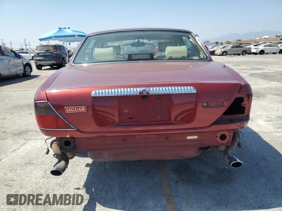 ✅ 1995 Jaguar XJ • VIN: SAJKX1744SC720830 • Lot: 69212295. Listed on Copart with 77,847 mi. Free auction sales archive from the USA and detailed vehicle history report at DreamBid. Image 6.