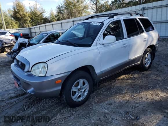 2001 Hyundai Santa Fe GLS z VIN KM8SC83D91U084712, wystawiony jako Copart lot #87107674 z przebiegiem 111 465 mil mil oraz Czysty tytuł • Clean title. Historia ofert i sprzedaży dostępna na DreamBid. Obrazek 1.