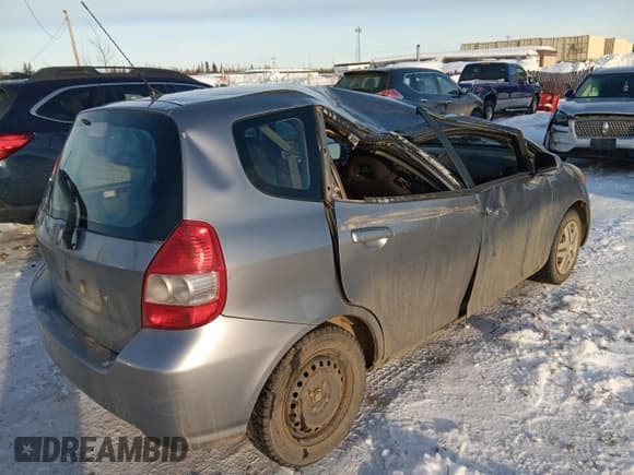 ✅ 2007 Honda Fit • VIN: JHMGD37477S000524 • Лот: 45520255. Опубликован ранее на Copart с пробегом 205 810 миль. Бесплатный доступ к архиву аукционных продаж из США и подробный отчёт об истории автомобиля на DreamBid. Изображение 3.