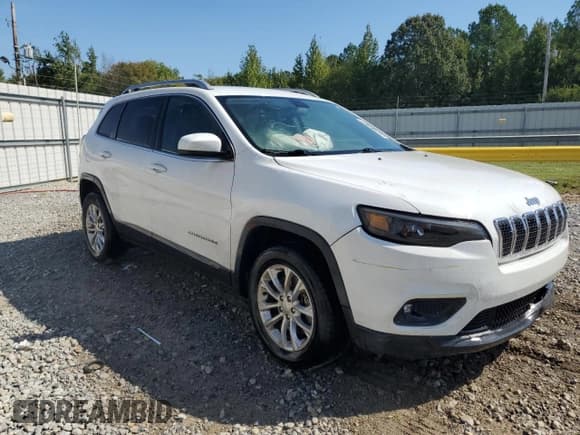 ✅ 2019 Jeep Cherokee Latitude • VIN: 1C4PJMCX7KD156222 • Lot: 86131935. Listed on Copart with 124,186 mi. Free auction sales archive from the USA and detailed vehicle history report at DreamBid. Image 4.
