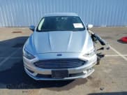 ✅ 2017 Ford Fusion Hybrid SE • VIN: 3FA6P0LU5HR217159 • Lot: 42200372. Listed on IAAI with 112,897 mi. Free auction sales archive from the USA and detailed vehicle history report at DreamBid. Image 13.