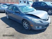 ✅ 2009 Mazda 6 S Grand Touring • VIN: 1YVHP82B795M01762 • Lot: 41925269. Listed on IAAI with 163,967 mi. Free auction sales archive from the USA and detailed vehicle history report at DreamBid. Image 1.