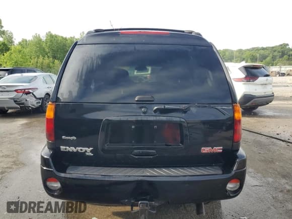 ✅ 2003 GMC Envoy SLT • VIN: 1GKET16S136129088 • Lot: 55842055. Listed on Copart with 185,473 mi. Free auction sales archive from the USA and detailed vehicle history report at DreamBid. Image 6.