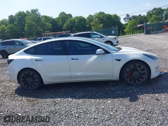 ✅ 2021 Tesla Model 3 Performance • VIN: 5YJ3E1EC4MF094253 • Лот: 42582581. Опубликован ранее на IAAI с пробегом 73 879 миль. Бесплатный доступ к архиву аукционных продаж из США и подробный отчёт об истории автомобиля на DreamBid. Изображение 13.