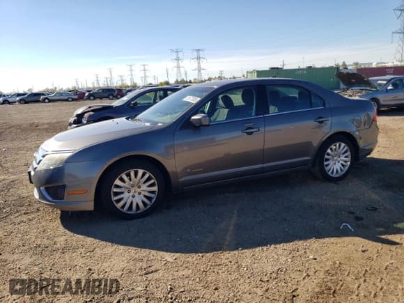 ✅ 2012 Ford Fusion Hybrid • VIN: 3FADP0L39CR391243 • Lot: 81672055. Listed on Copart with 126,512 mi. Free auction sales archive from the USA and detailed vehicle history report at DreamBid. Image 1.