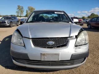 ✅ 2009 Kia Rio LX • VIN: KNADE223796504896 • Lot: 74884404. Listed on Copart with 110,038 mi. Free auction sales archive from the USA and detailed vehicle history report at DreamBid. Image 5.