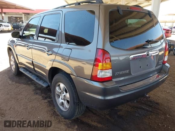 ✅ 2003 Mazda Tribute LX • VIN: 4F2YZ04173KM30578 • Lot: 42587190. Listed on IAAI with 158,185 mi. Free auction sales archive from the USA and detailed vehicle history report at DreamBid. Image 3.