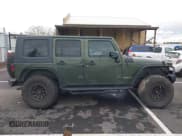 ✅ 2008 Jeep Wrangler Unlimited Rubicon • VIN: 1J8GA69168L591089 • Lot: 41487746. Listed on IAAI with 161,916 mi. Free auction sales archive from the USA and detailed vehicle history report at DreamBid. Image 14.