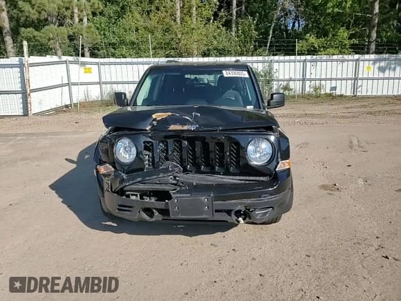 ✅ 2016 Jeep Patriot Latitude • VIN: 1C4NJPFB2GD609534 • Лот: 84390805. Опубликован ранее на Copart с пробегом 92 077 миль. Бесплатный доступ к архиву аукционных продаж из США и подробный отчёт об истории автомобиля на DreamBid. Изображение 14.